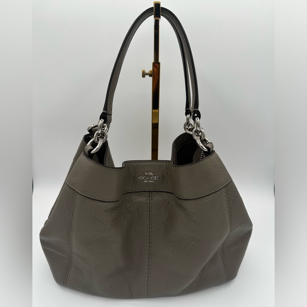 Gray & Silver COACH handbag. NWOT & comes with original strap.